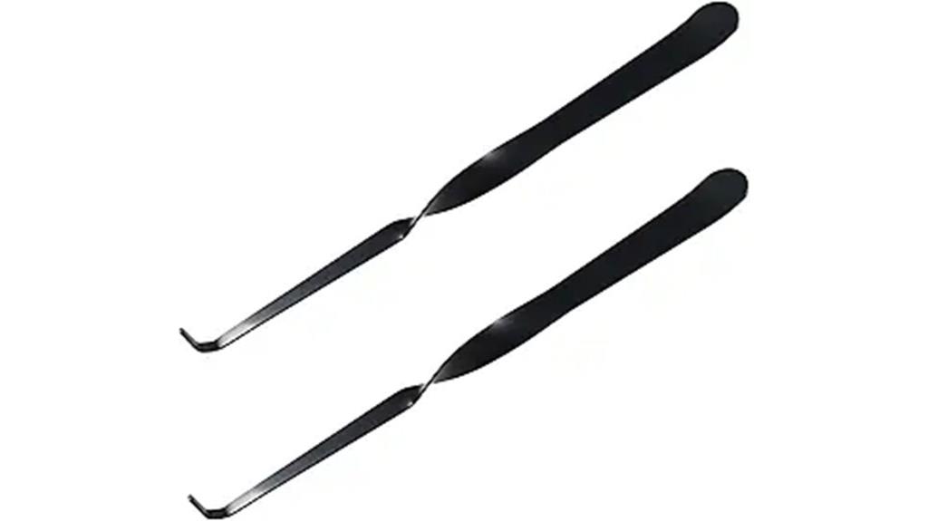 two stainless steel wick dippers
